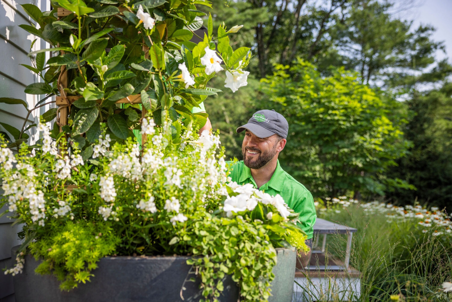 NatureWorks employee tending to a garden
