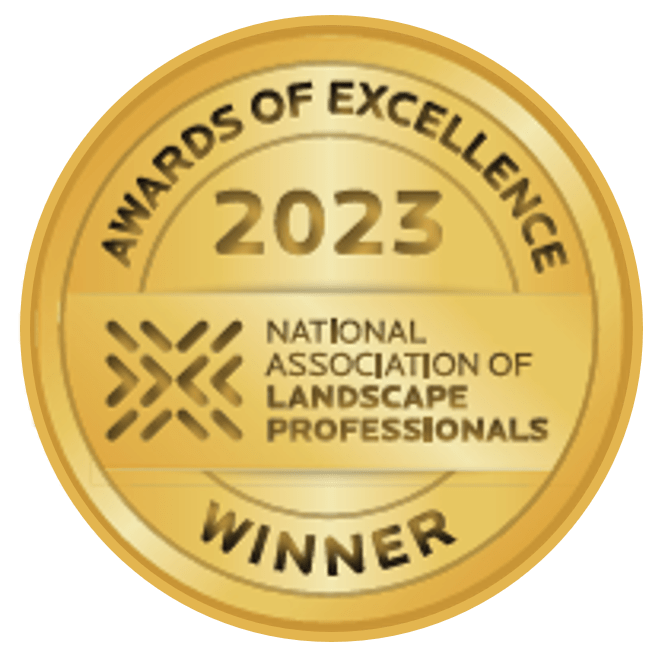 This image shows a golden seal with the text "Awards of Excellence 2023," suggesting a recognition by the National Association of Landscape Professionals.